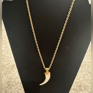 Brand new never worn Gold tone mother of pearl horn necklace